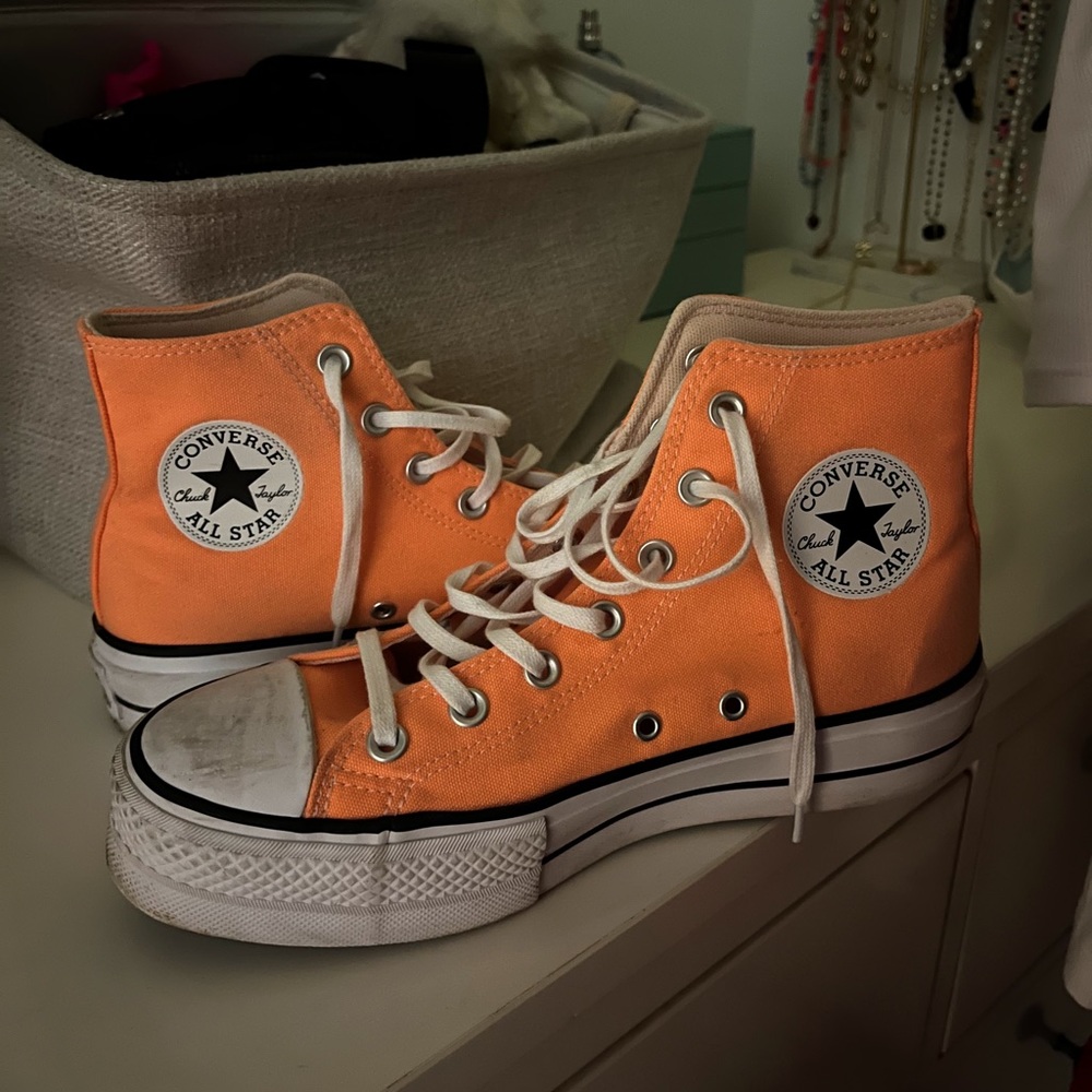 Bright orange platform converse